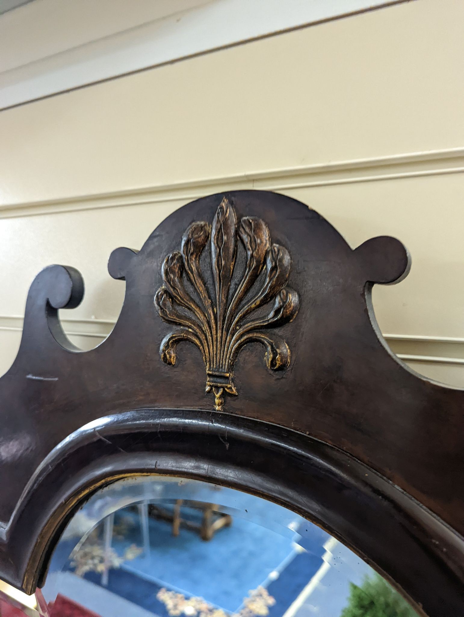 An early 20th century George III style parcel gilt fret cut mahogany wall mirror, width 59cm, height 112cm